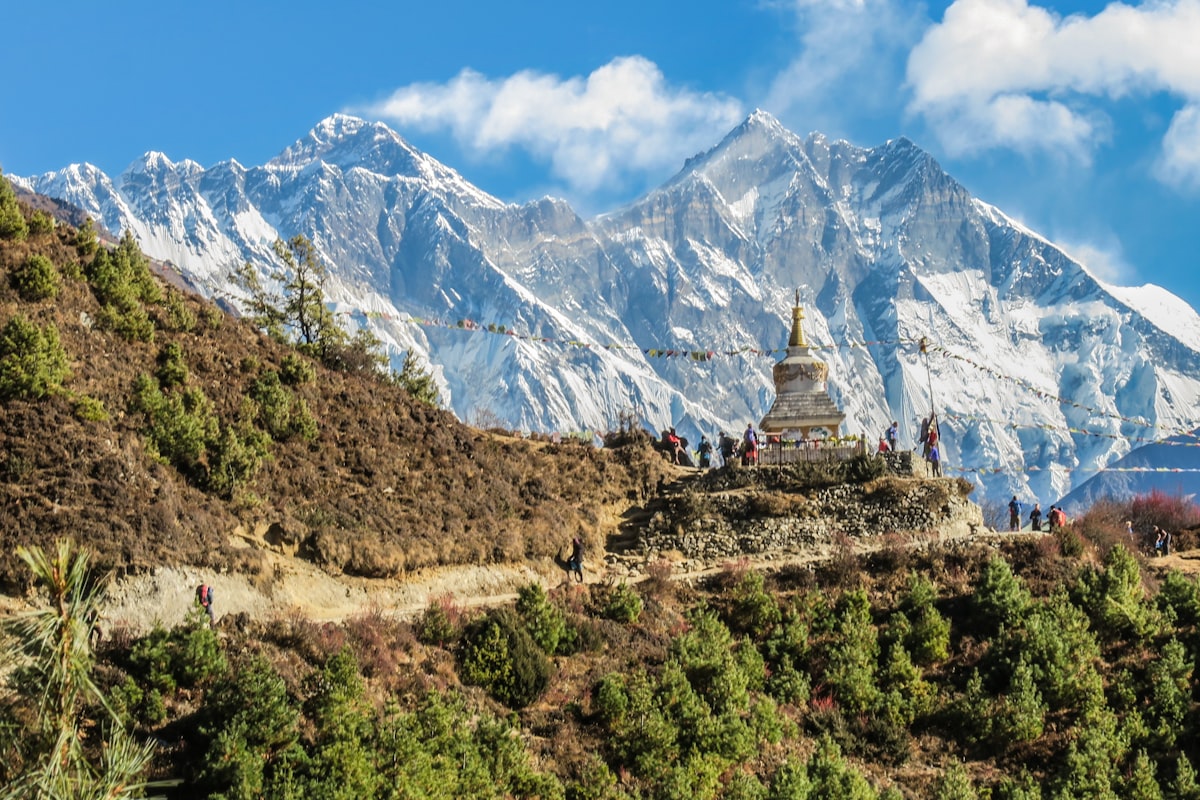 Trekker before Himalayan peaks
